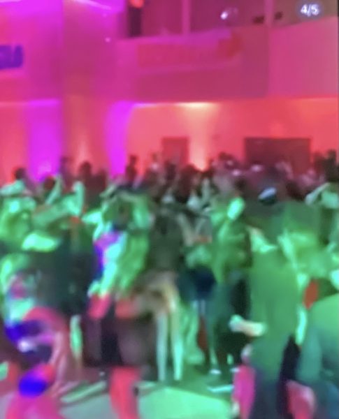 A clip from a video of students dancing.