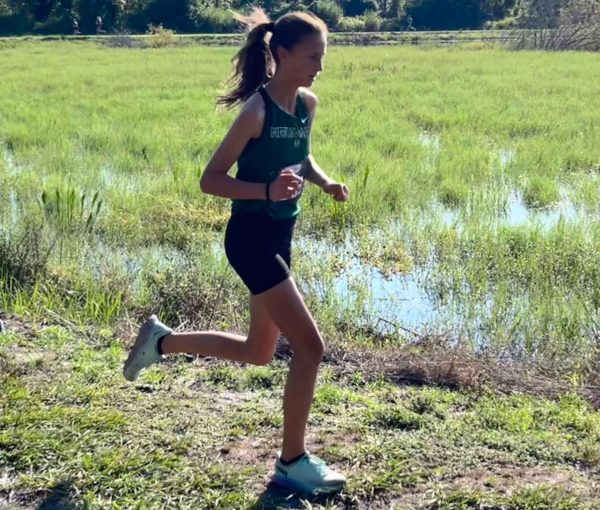 Kailyn running at cross country meet