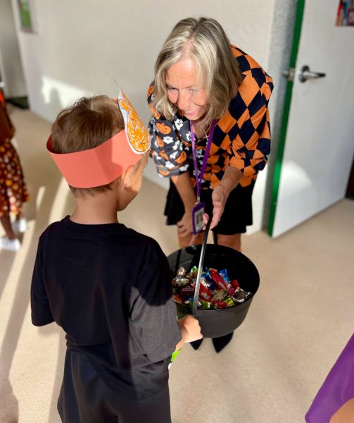 Doc Noonan handing out treats to Seton kids.